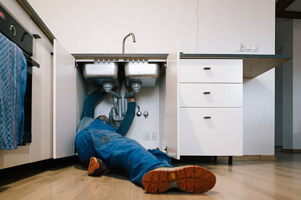 Professional Plumbing technician working in Lake, MS